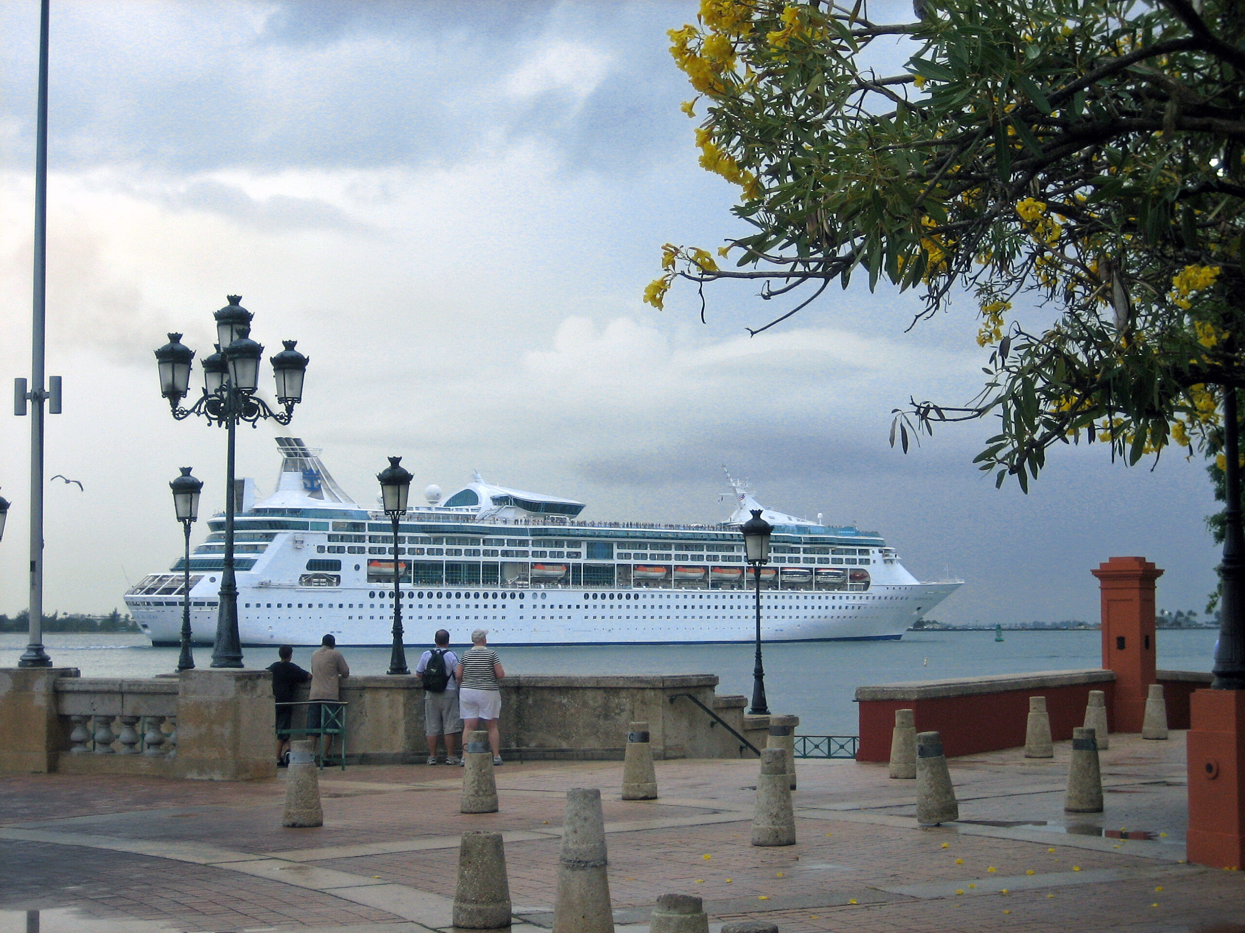 Cruise ship passing Old San Juan waterfront in Puerto Rico