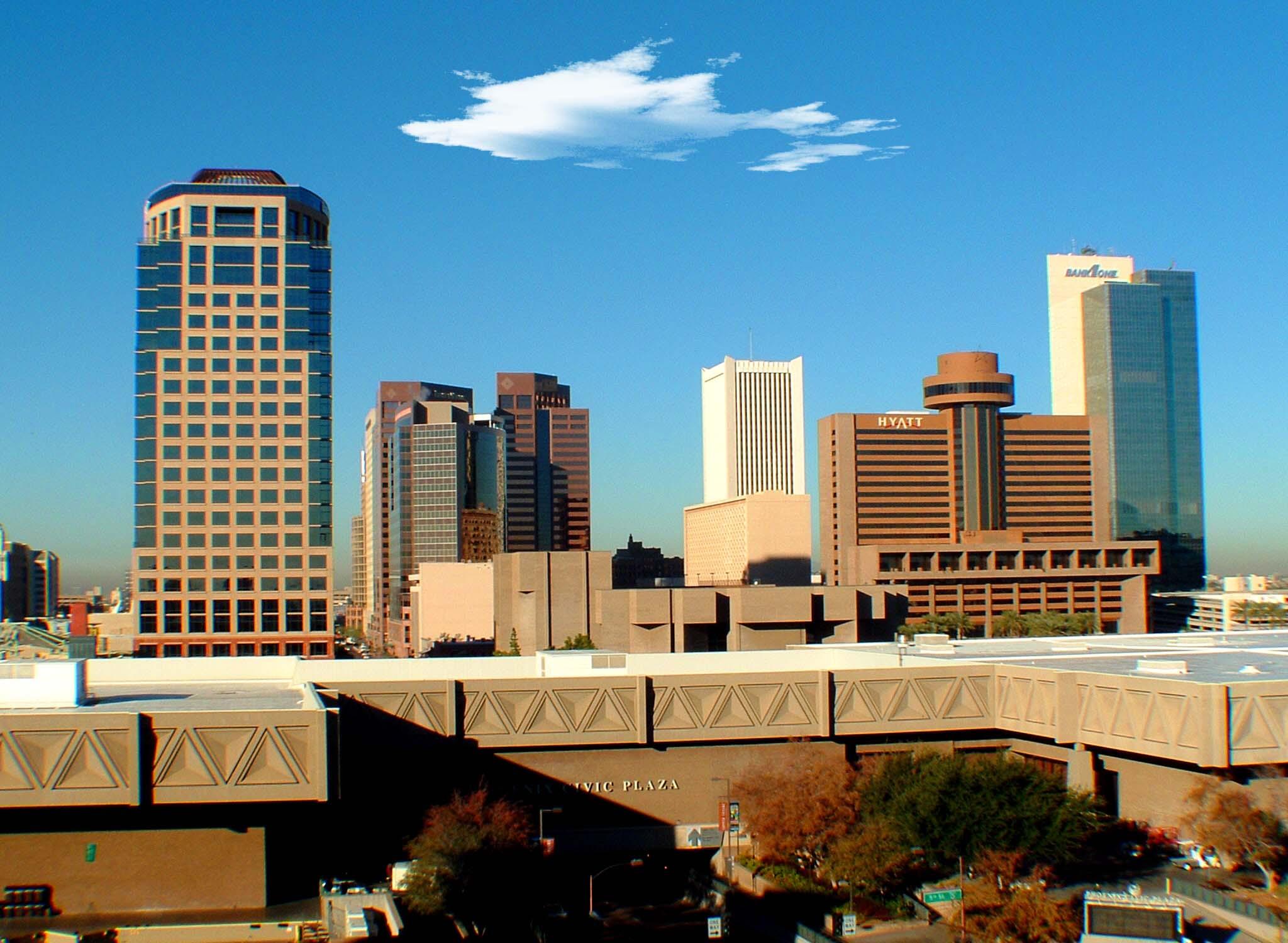 Downtown Phoenix skyline under a bright blue Arizona sky